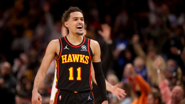Trae Young smiles after a made shot.